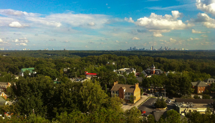 A view over the neighborhood of Vinings, GA, from Emcien's office (our new home is at the bottom of the hill to the right). In the background is downtown Atlanta.